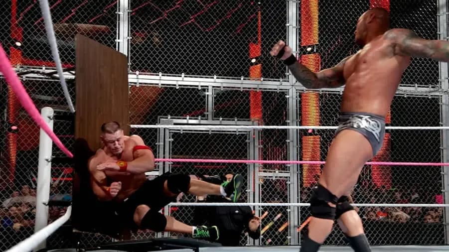 https://cultaholic.com/files/images/7b57b23bdc8b26c5659ca812daf7770245c5e9e2-john-cena-randy-orton-hell-in-a-cell-2014.jpg