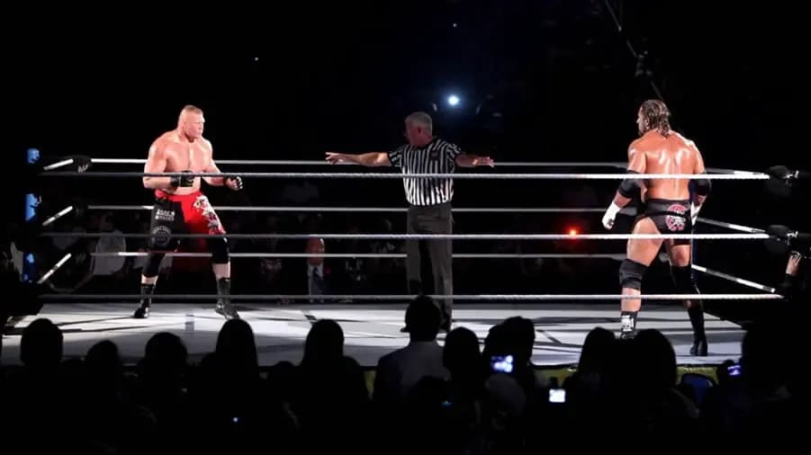 https://cultaholic.com/files/images/825b7702a105fba3479ebce89e0dea146f687399-brock-lesnar-triple-h-summerslam-2012.jpg