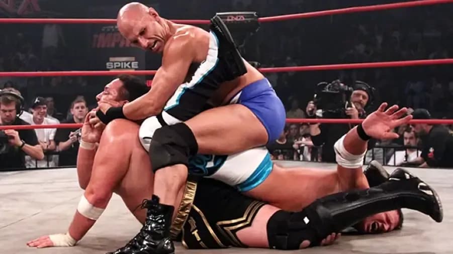 https://cultaholic.com/files/images/8d5d858c1b0cdb336408f0f7baad581f0b942a18-christopher-daniels-aj-styles-samoa-joe.jpg