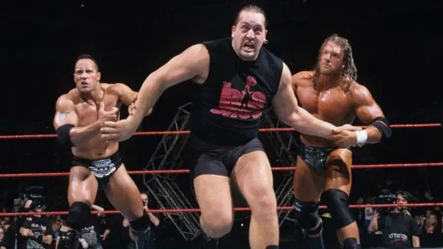 https://cultaholic.com/files/images/a5c99a6cdf97ecfd2b271702ff0bd017670d19bb-The-Rock-Big-Show-Triple-H.jpg