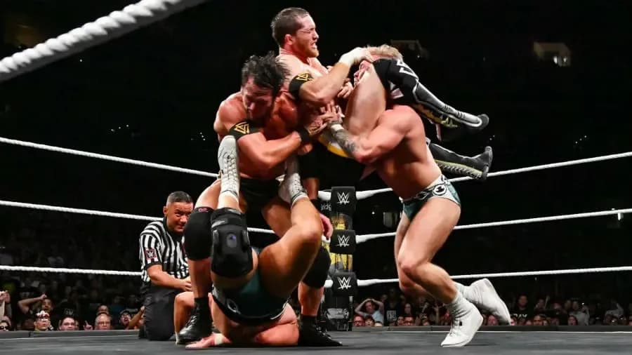 https://cultaholic.com/files/images/ffb87518b9acb215251c488f9e7a6405619abad9-Undisputed-Era-Moustache-Mountain.jpg