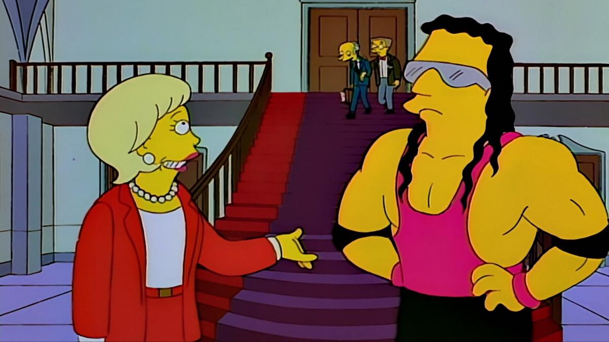 Bret Hart stood with the estate agent on The Simpsons