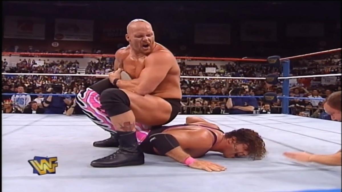 Steve Austin with Bret Hart in a Sharpshooter