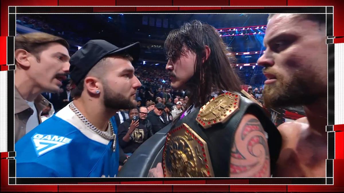 Cam Skattebo going face to face with Dominik Mysterio, with Andrew Schulz behind Skattebo and JD McDonagh next to Dominik