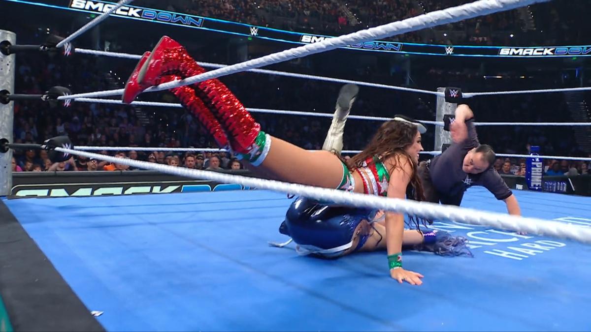Chelsea Green pinning Giulia with her feet on the ropes on WWE SmackDown