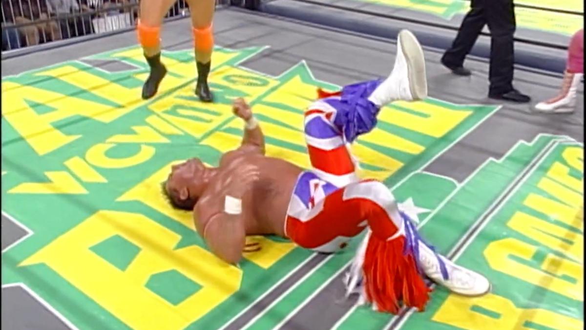 Davey Boy Smith lying on the mat in agony at WCW Fall Brawl 1998