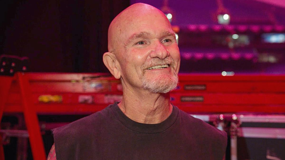 Gillberg in a vest and smiling in 2021