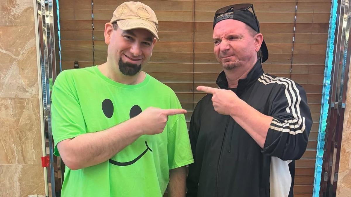 Green Shirt Guy and James Ellsworth pointing at each other