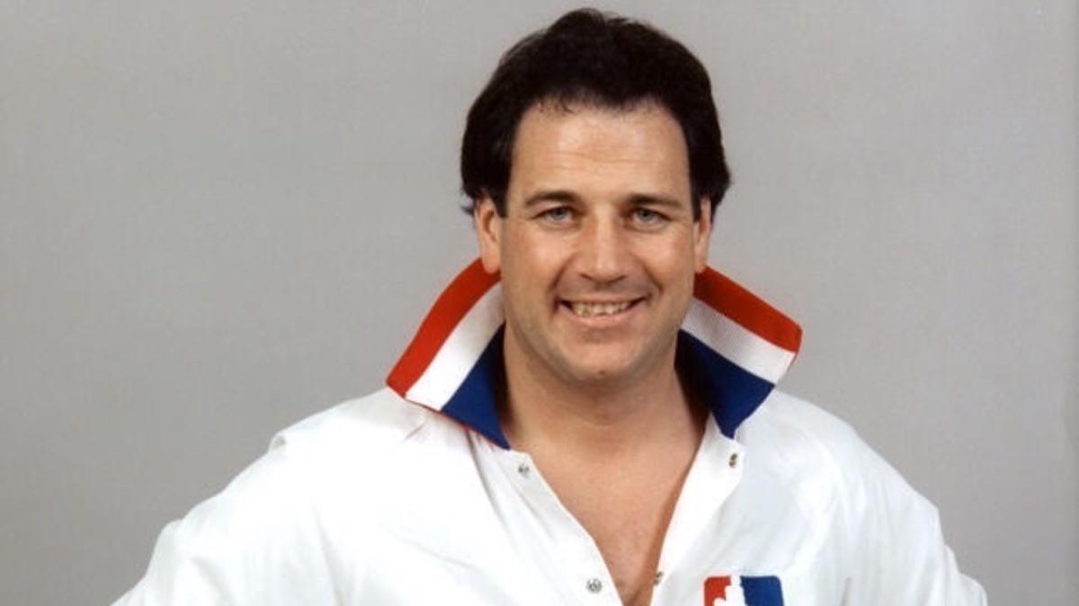 Greg Gagne wearing a white tracksuit jacket