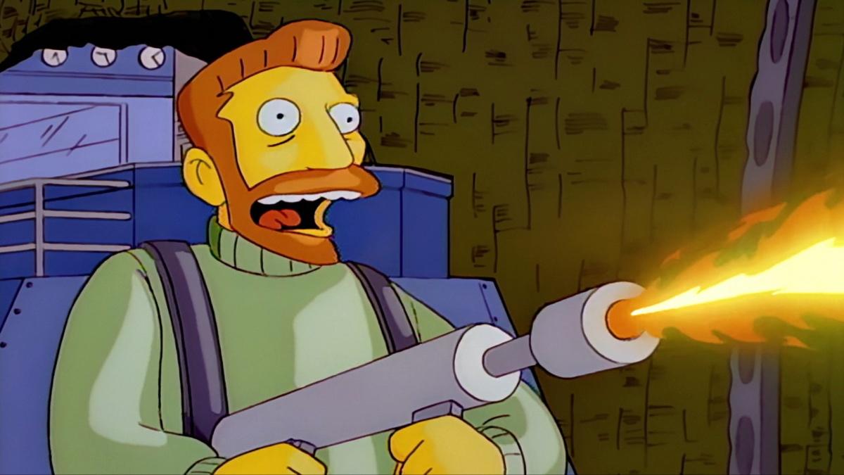 Hank Scorpio laughing manically holding a flamethrower