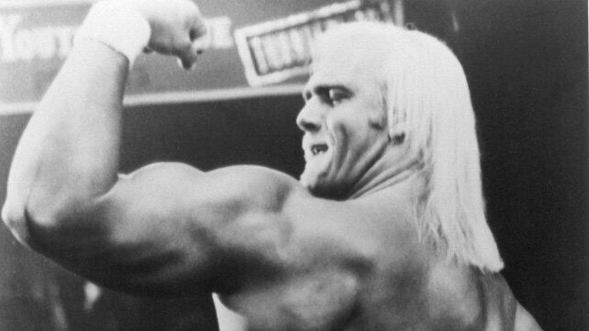 Hulk Hogan flexing his muscles in the AWA