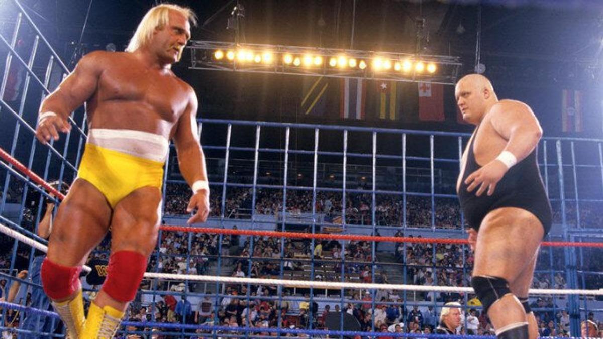 Hulk Hogan and King Kong Bundy inside a steel cage at WWE WrestleMania 2