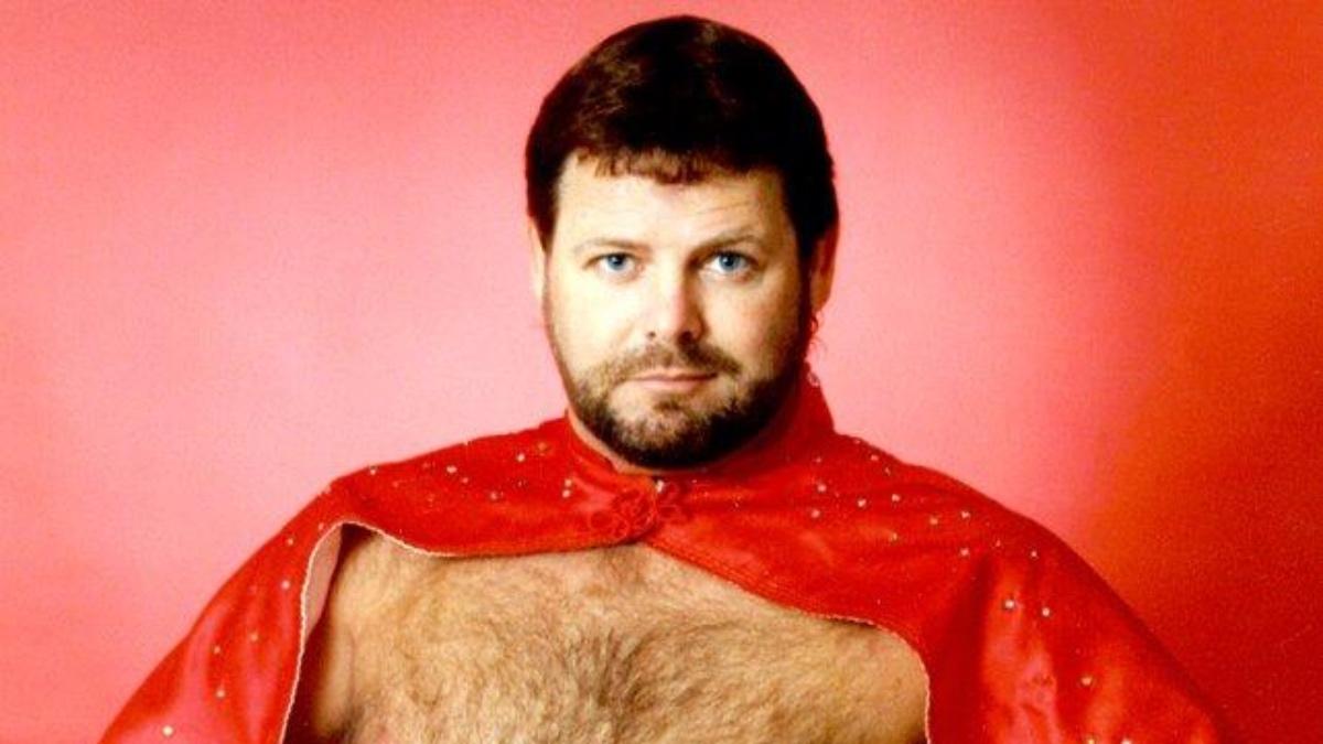 Jerry Lawler wearing a red cape