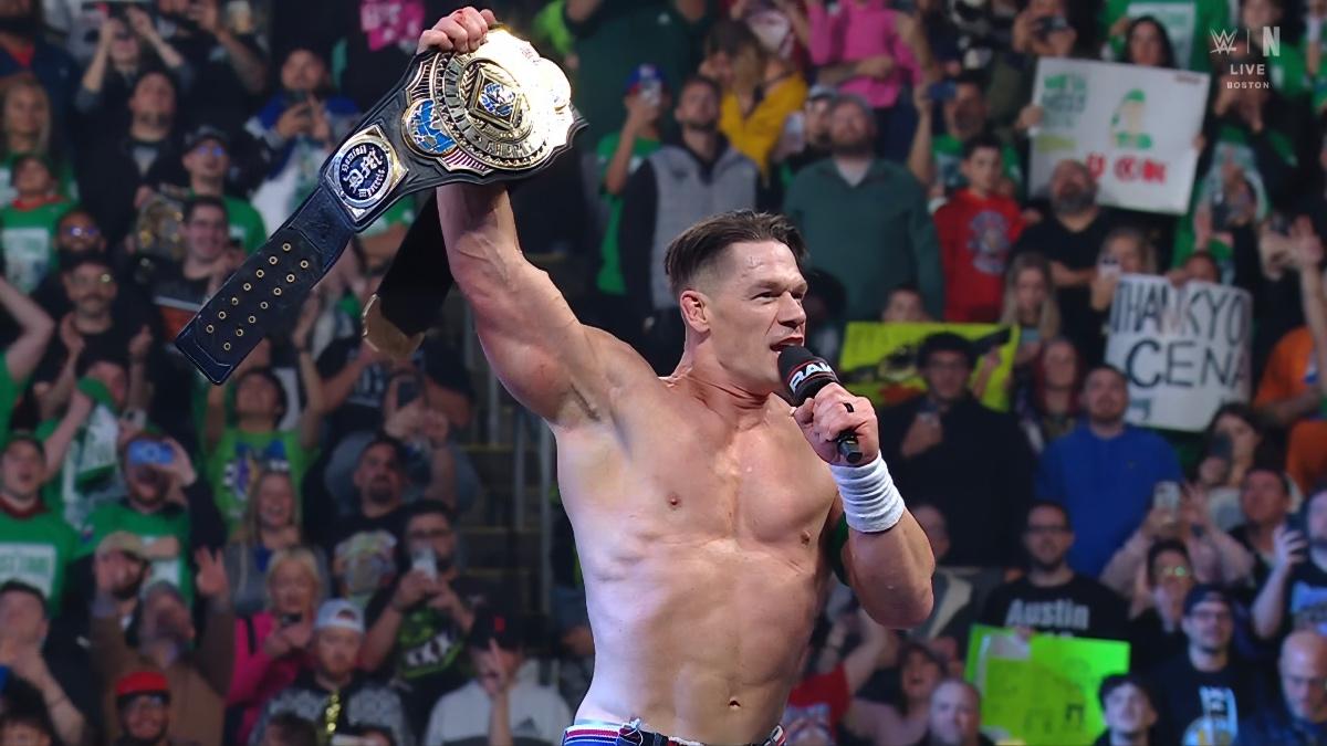 John Cena raising the WWE Intercontinental Title