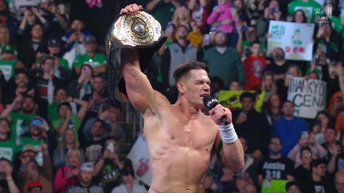 John Cena raising the WWE Intercontinental Title