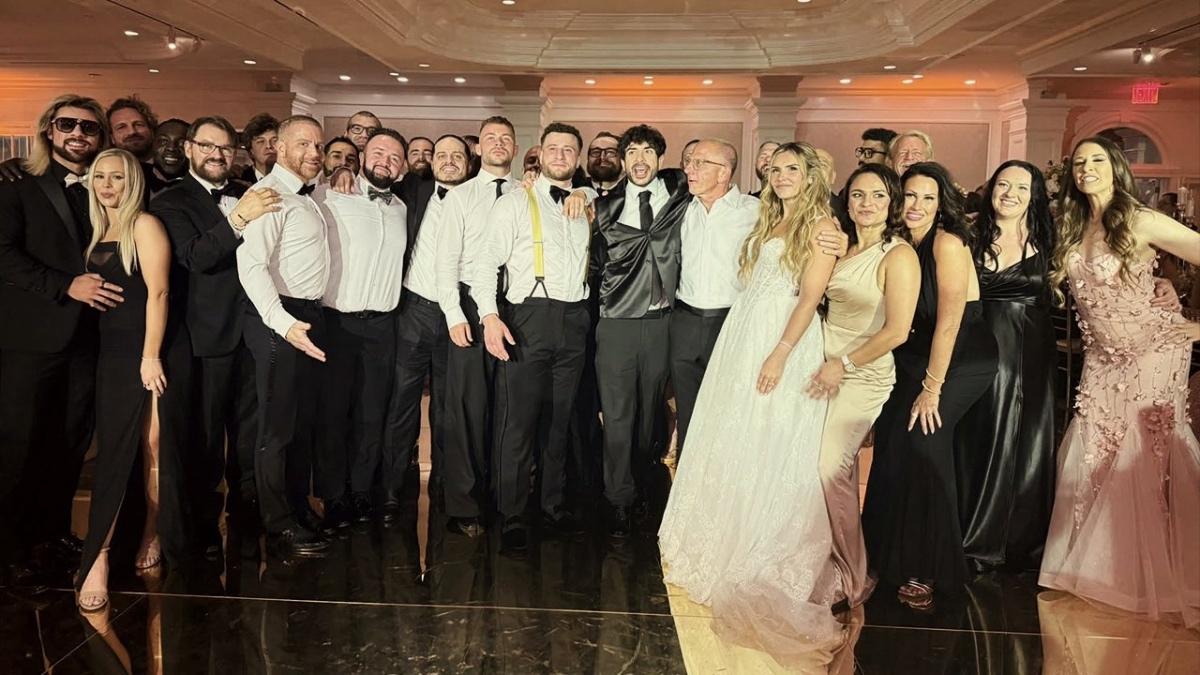 AEW wrestlers standing in a line for photos at MJF's wedding