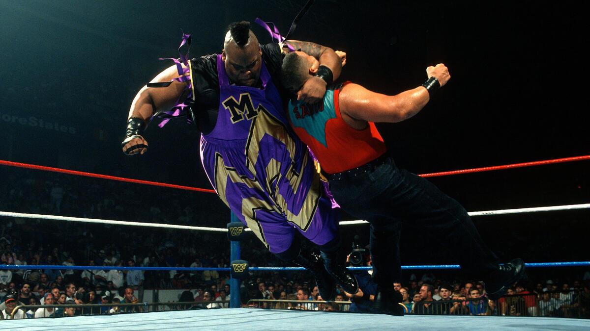 Mabel hitting a clothesline on Savio Vega at WWE King of the Ring 1995