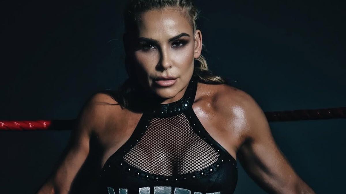 Natalya as Nattie Neidhart in a black leather vest