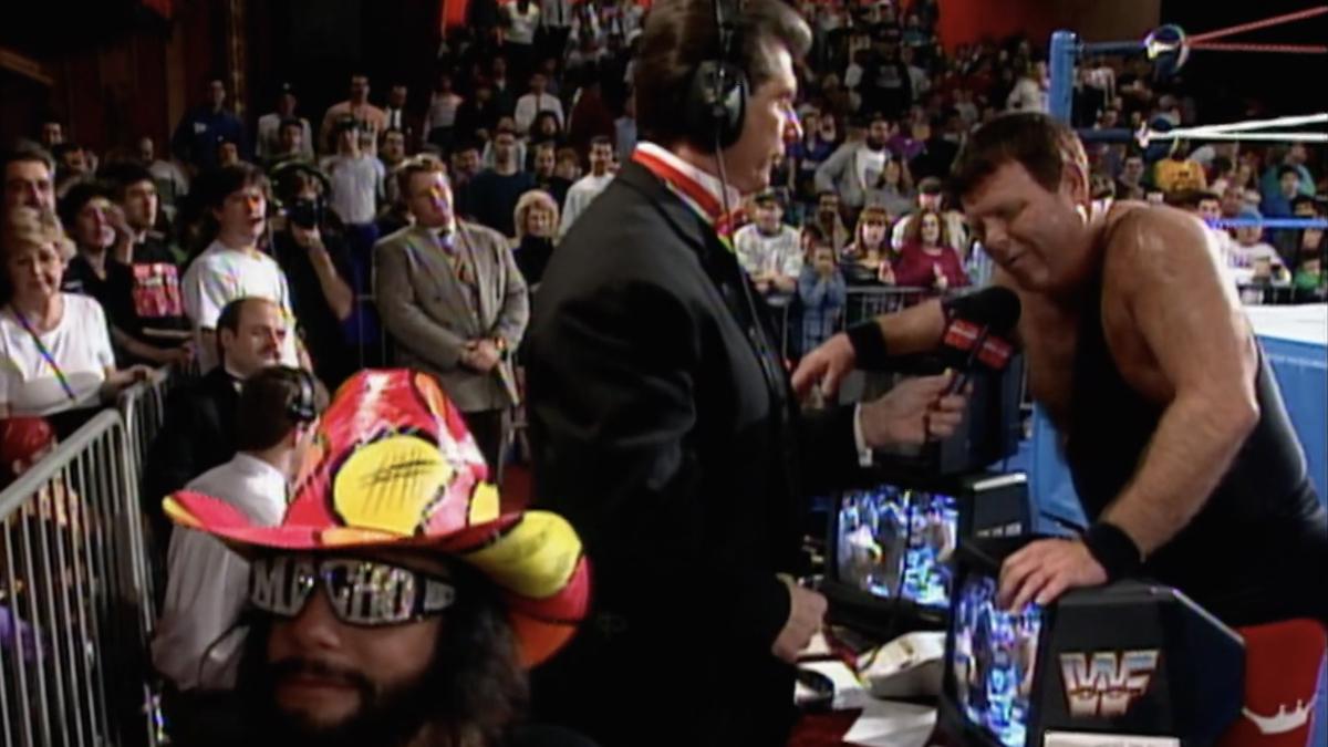 Jerry Lawler speaking to Vince McMahon at announce table on Raw after WrestleMania IX