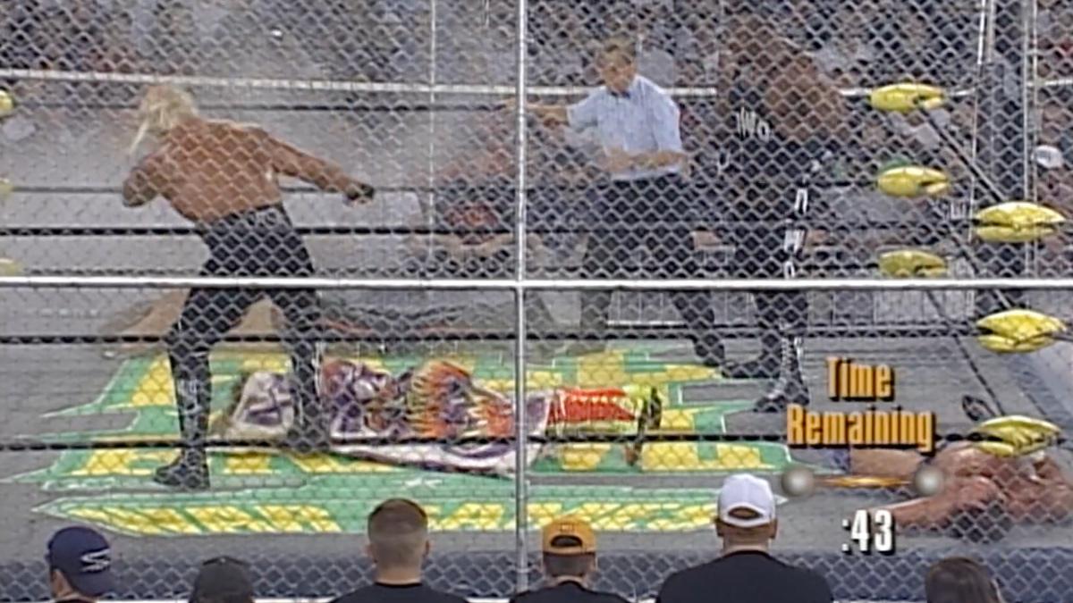 Hulk Hogan kicking The Renegade at WCW Fall Brawl 1998