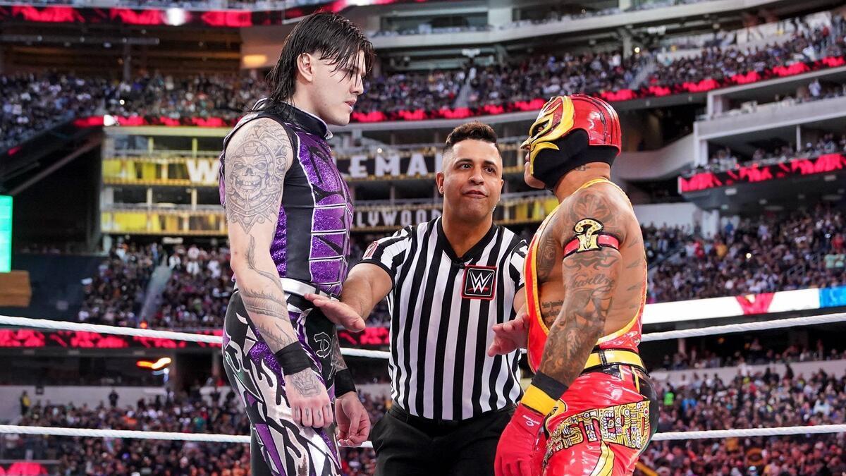 Rey Mysterio and Dominik Mysterio facing off at WWE WrestleMania 39