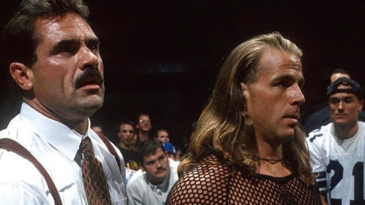 Rick Rude stood with Shawn Michaels