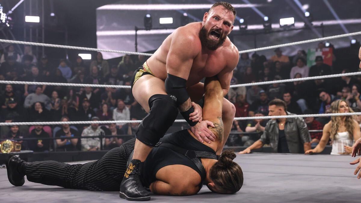 Ridge Holland working over Tony D'Angelo on WWE NXT