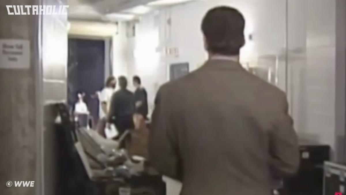 The Rock and Mankind chatting to each other at WWE Rock Bottom 1998