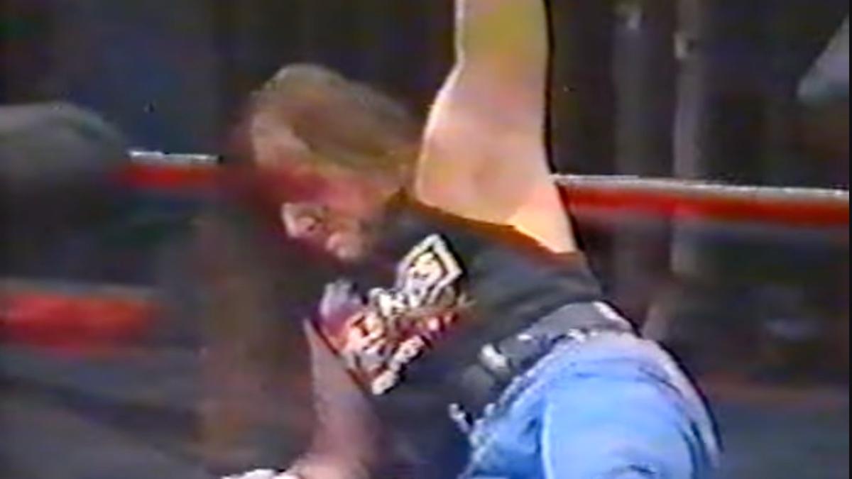 Shawn Michaels handcuffed to the rope at TWA In 2000