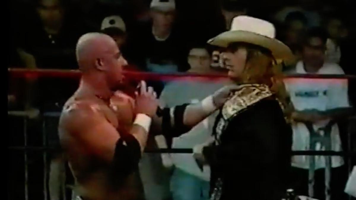 Justin Credible giving the TWA Heavyweight Title to Shawn Michaels