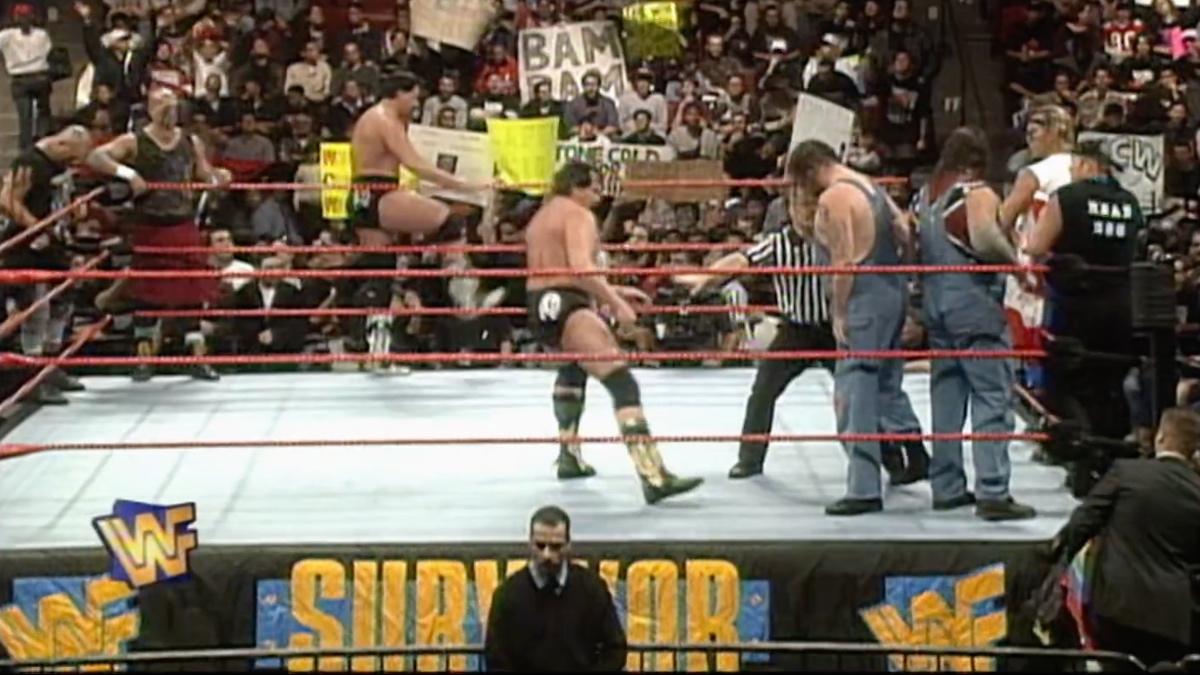 The New Age Outlaws, The Godwinns, The Headbangers and New Blackjacks at Survivor Series 1997 stood in the ring