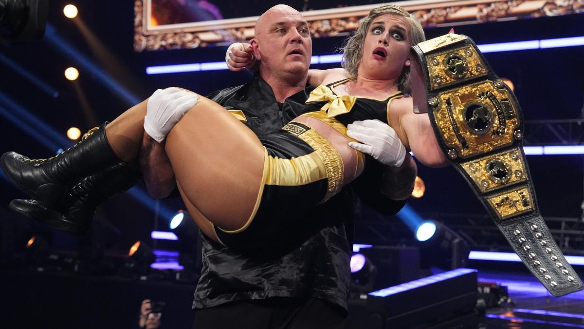 Luther holding Toni Storm in his arms at AEW Dynasty 2025