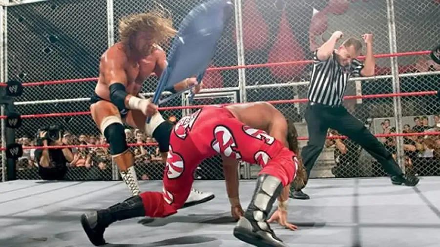 https://cultaholic.com/files/images/a1e260ec87515288c2b055343cc7d28f15a20a29-triple-h-shawn-michaels-badd-blood-2004.jpg